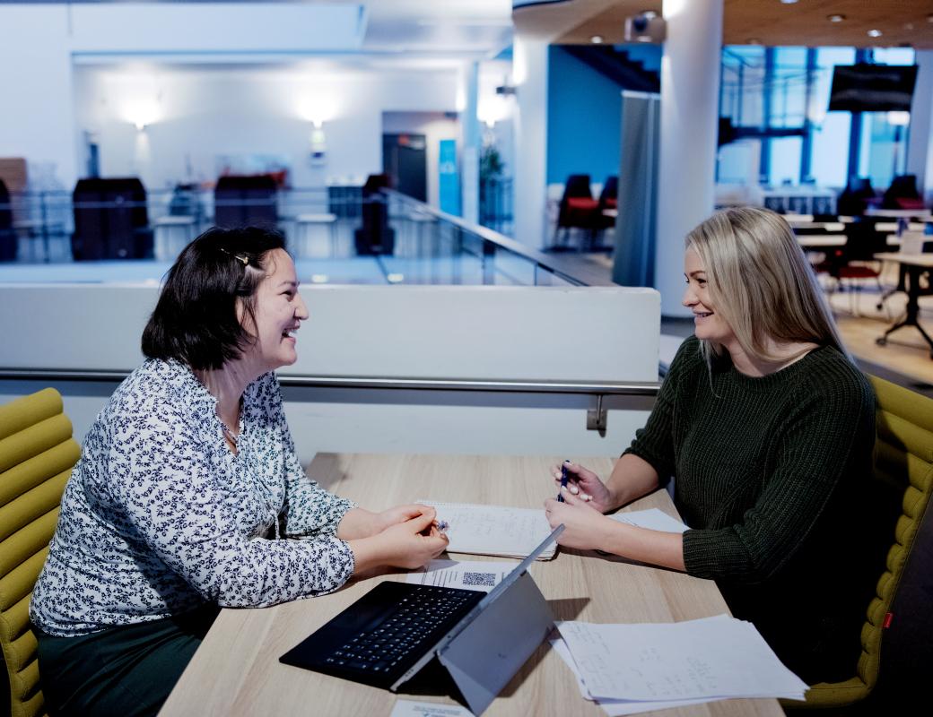 Two students discussing on campus